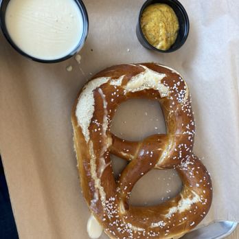 Prost Brewing - Pretzel with mustard and cheese fondue - Breweries Near Me - Northglenn, Colorado Prost Brewing - Pretzel with mustard and cheese fondue - Breweries Near Me - Northglenn, Colorado