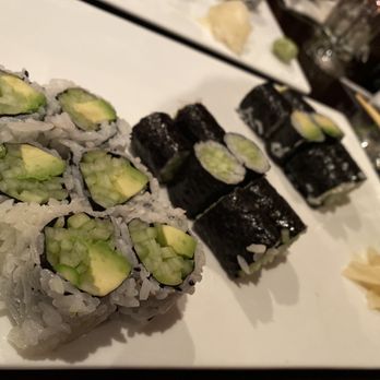 Blossom Asian Bistro - a plate of sushi and chopsticks - Asian Fusion Near Me - Wayne, New Jersey