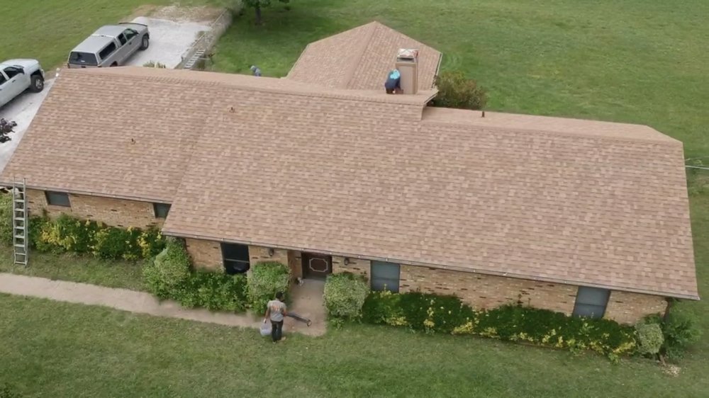 Slide of IronHouse Roofing