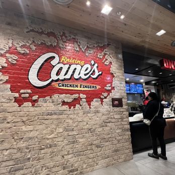 Raising Cane's Chicken Fingers - Raising Cane's logo - Fast Food Near Me - Palmdale, California Raising Cane's Chicken Fingers - Raising Cane's logo - Fast Food Near Me - Palmdale, California