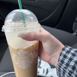 Iced caramel brûlée latte and double smoked bacon sand which Iced caramel brûlée latte and double smoked bacon sand which