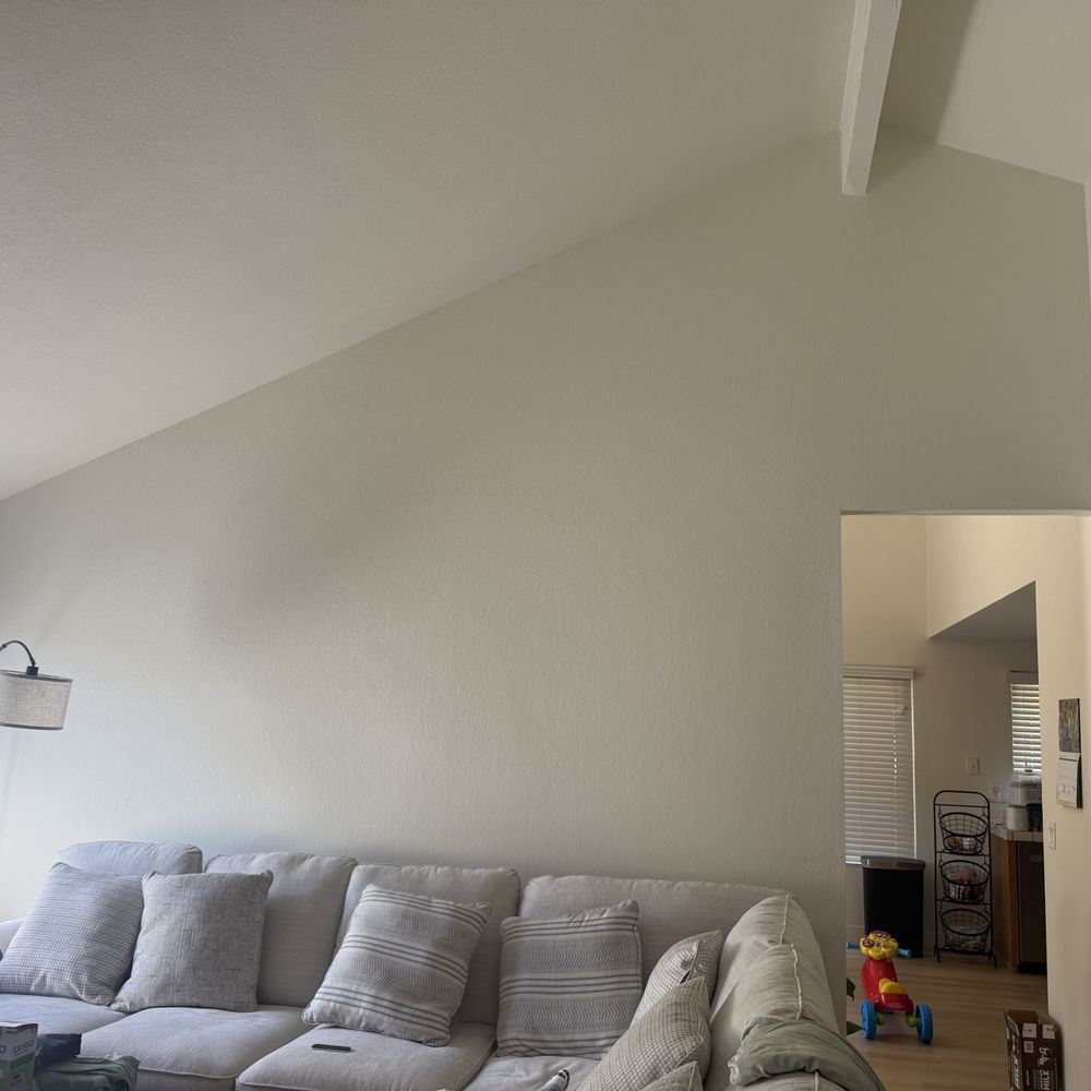 Bobadilla's Precision Construction - The wall from the living room before the removal - General Contractors Near Me