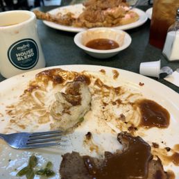 Meatloaf, mashed potatoes and green beans, chicken on the bone with waffles, with strawberry butter and spicy syrup.