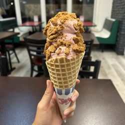 Raspberry custard with Biscoff cookie crumble