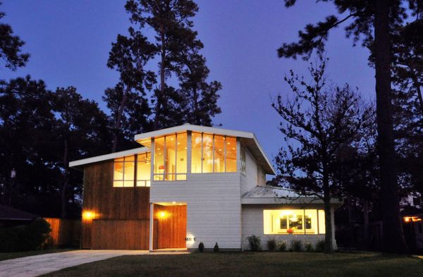 LEED Silver Single Family Home - Muller Architecture designed this house for a new couple looking to raise a family. The house is a slender 3,000 square feet, has three bedrooms, three bathrooms, an outdoor kitchen, a pool and lots of windows. The house also qualified for LEED Silver status with its use of materials, the construction practices and its central location to nearby amenities. LEED Silver Single Family Home - Muller Architecture designed this house for a new couple looking to raise a family. The house is a slender 3,000 square feet, has three bedrooms, three bathrooms, an outdoor kitchen, a pool and lots of windows. The house also qualified for LEED Silver status with its use of materials, the construction practices and its central location to nearby amenities.