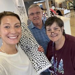 The Stitch House - Maddie and us! She is so sweet, full od energy and always willing to show you the features on any machine!