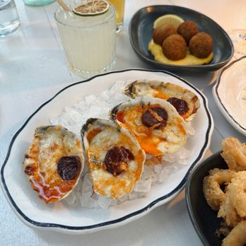 The River Oyster Bar - Baked oysters - Seafood Near Me - Miami, Florida The River Oyster Bar - Baked oysters - Seafood Near Me - Miami, Florida