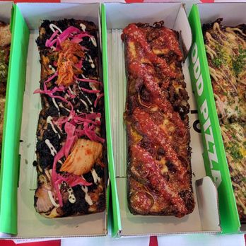 MOTO - Edmonds - Left to right: Mr. Pig, Beef Adobo, Kissd, Black Garlic Cheezy Bread. - Pizza Near Me - Edmonds, Washington