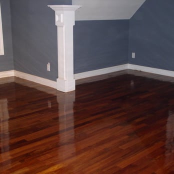 Supreme Hardwood Floors - a hardwood floor in a room - Flooring Near Me Supreme Hardwood Floors - a hardwood floor in a room - Flooring Near Me