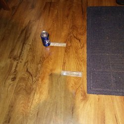 Carpet Direct - This shows some of the gaps. Pop can for scale.