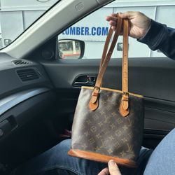 Park Aire Shoe and Repair - Repaired water damage to a LV bag