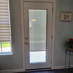 American General Windows - We replaced an older door with grids on the glass with a beautiful new door featuring enclosed, movable blinds between the glass.
