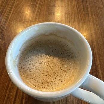 Cafe Mila - Cafe au lait was definitely hot and delicious.   The eggs perfect bacon crispy and the French toast cinnamon delicious. - Coffee & Tea Near Me - The Colony, Texas