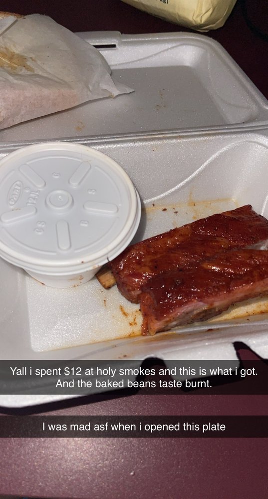 Holy Smokes BBQ And Catering Logo
