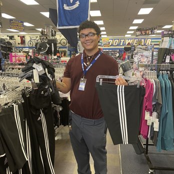 Big 5 Sporting Goods - Andre, Asst. Manager-Apparel & Active wear, holding my cool new sports bras & shorts he helped me find. Julie A - Sporting Goods Near Me - Sparks, Nevada