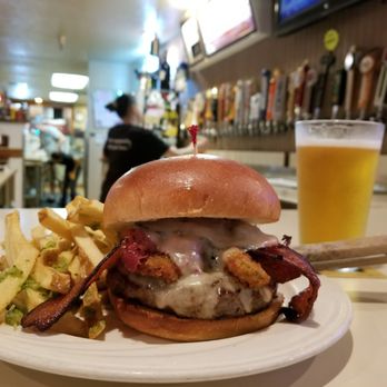 The Brick Oven Pub - Pastrami burger with bacon and fried jalapenos! Side of garlic fries and a Fort Rock Pilsner : ) you can see the 30 beer taps in the back. - Pizza Near Me - Placerville, California The Brick Oven Pub - Pastrami burger with bacon and fried jalapenos! Side of garlic fries and a Fort Rock Pilsner : ) you can see the 30 beer taps in the back. - Pizza Near Me - Placerville, California
