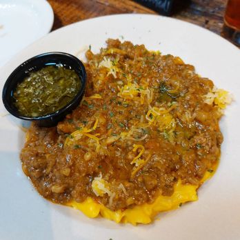 Eden Abbey Brewing Community - Abby cheesy Mac ($8) with what's your beef topping ($7). Comes with chimichurri sauce (don't put the sauce on there) - Brewpubs Near Me - Mount Dora, Florida