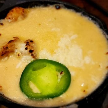 Uncle Julio's - Flaming shrimp queso - Tex-Mex Near Me - Columbia, Maryland Uncle Julio's - Flaming shrimp queso - Tex-Mex Near Me - Columbia, Maryland