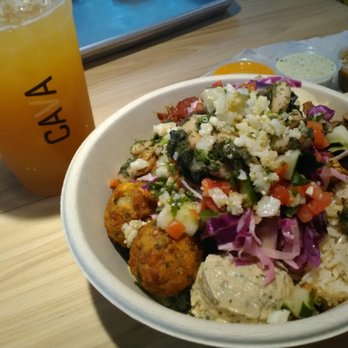 CAVA - Greens & grains bowl with falafel and chicken and a Peach Green Tea. So good. - Mediterranean Near Me - Huntersville, North Carolina