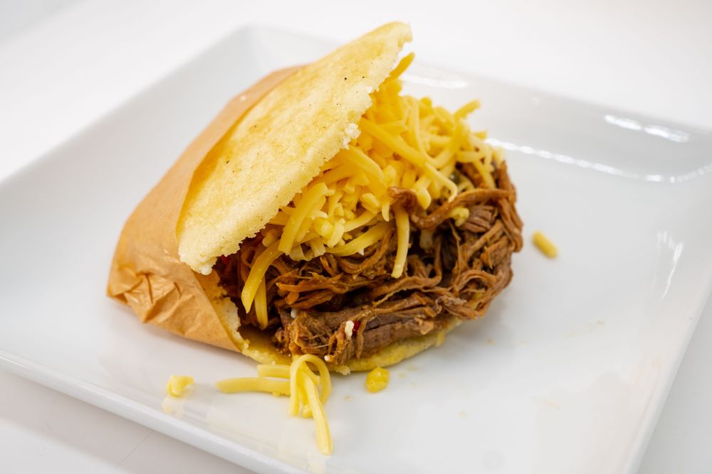 Dale Arepa Bar & Healthy Bistro Logo
