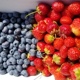 Freshly picked strawberries and blueberries
