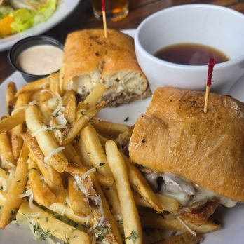 Backstreets Grill - Prime rib sandwich, au jus and upgraded parm truffle fries - New American Near Me - Columbia, South Carolina