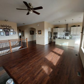 Seymour Floors - a living room with a ceiling fan - Flooring Near Me Seymour Floors - a living room with a ceiling fan - Flooring Near Me