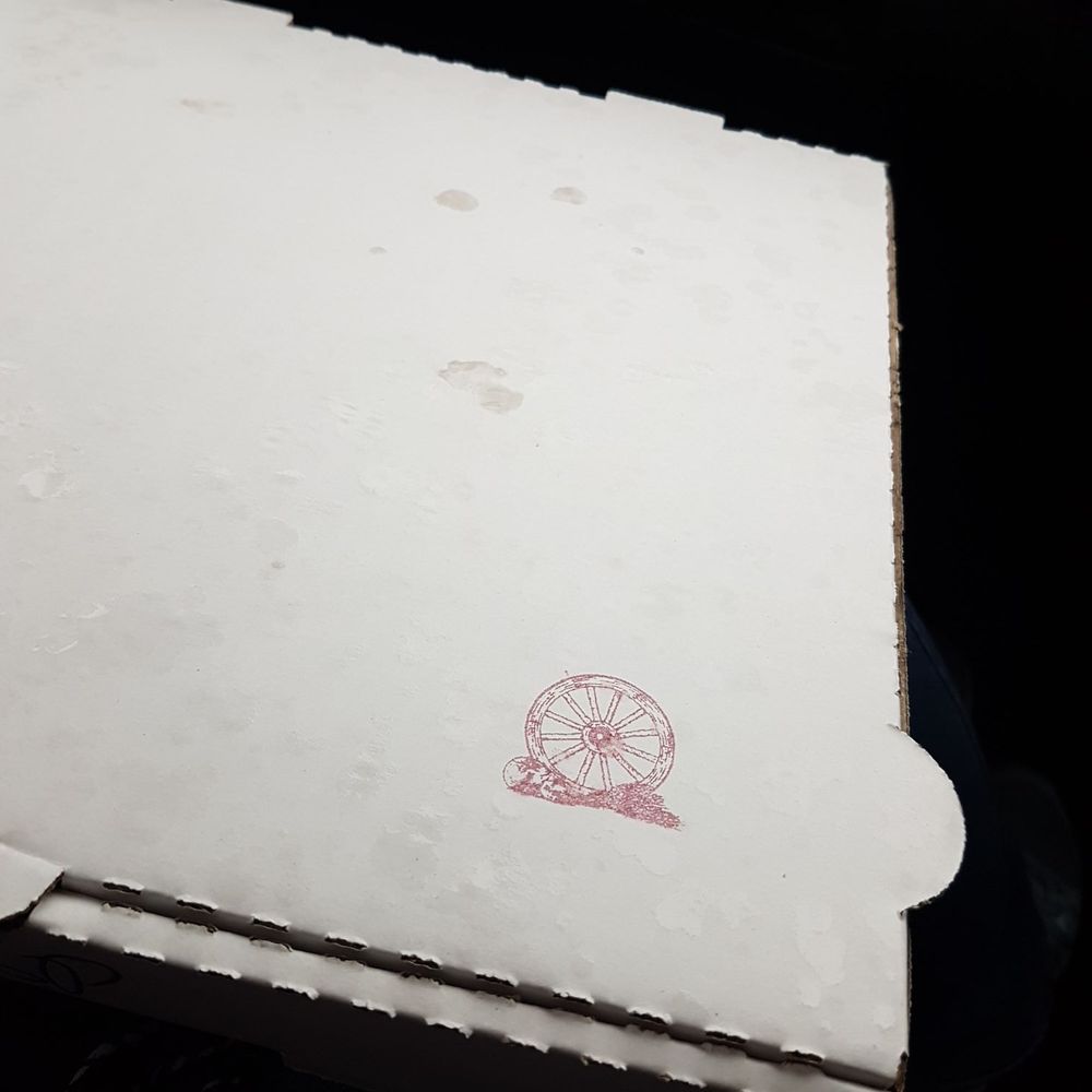 The Wheel Oakley - The pizza box stamped with this logo = heaven in your mouth - Italian Near Me - Cincinnati, Ohio