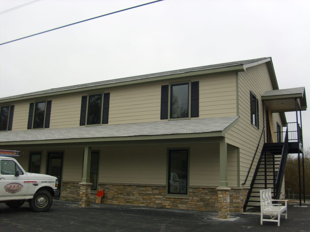 Slide of Terry Asbury Roofing