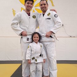 Me, with my son and daughter on the mats