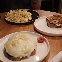 5 scrambled eggs  Specialty toast (sunflower butter w/ bananas/honey/cinnamon Specialty avocado toast w/ tomato, basil and 2 over easy eggs