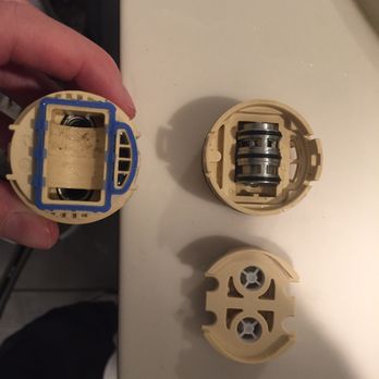 Service Pros Plumbers - In my hand is the new delta cartridge delta that this company refused to use. To the right are the new caps I had that they refused to use. - Plumbing Near Me - Antioch, California