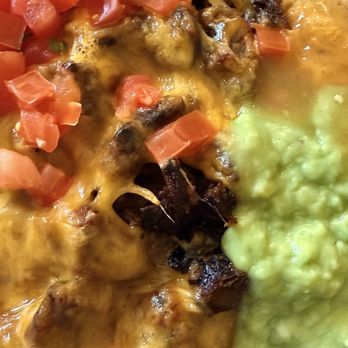 Miguels Jr - Cheesy nachos with burnt asada bits. Shame. They used to have good nachos. - Mexican Near Me - Orange, California Miguels Jr - Cheesy nachos with burnt asada bits. Shame. They used to have good nachos. - Mexican Near Me - Orange, California