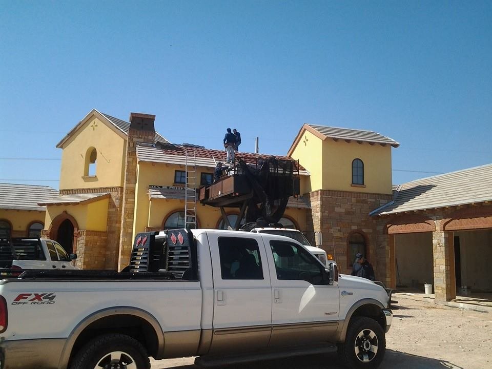 Slide of Candela Roofing