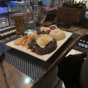 Terra Sur Cafe - Steak with fried egg, rice, fries and fried sweet plantains - Peruvian Near Me - Tampa, Florida Terra Sur Cafe - Steak with fried egg, rice, fries and fried sweet plantains - Peruvian Near Me - Tampa, Florida