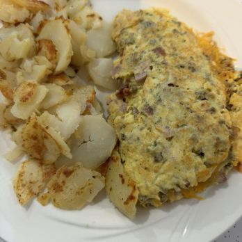 Indiana Pancake House - Meat lovers omelet and hash browns - American Near Me - Bluffton, Indiana