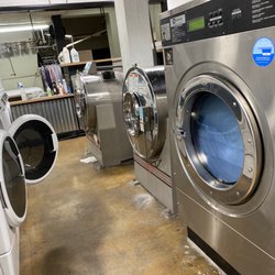 Faye's Laundry & Drycleaning - Large and small commercial size washers.
