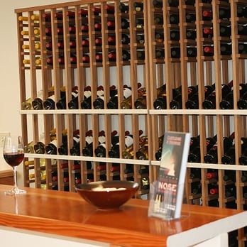 Cartlidge & Browne Winery - a wine rack with bottles of wine - Wineries Near Me - Santa Rosa, California Cartlidge & Browne Winery - a wine rack with bottles of wine - Wineries Near Me - Santa Rosa, California