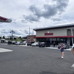 Wawa - Outside view with reserved parking in front of the store for those waiting on ordets