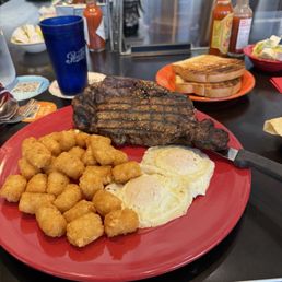 Colorado Ribeye with eggs and tots