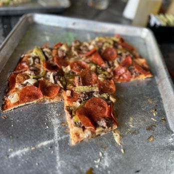 Joe Boccardi's Ristorante - The remains of our large Joe's special pizza - Pizza Near Me - Eureka, Missouri