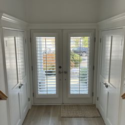 Sunburst Shutters & Window Fashions