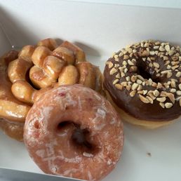 Pine Cone, Strawberry Cake Donut, Peanut Chocolate Frosted