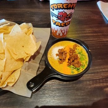Torchy's Tacos - Green Chile Queso & Chips - Tex-Mex Near Me - Houston, Texas Torchy's Tacos - Green Chile Queso & Chips - Tex-Mex Near Me - Houston, Texas