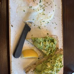Avocado toast with basted eggs