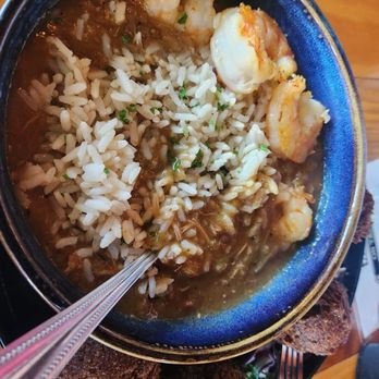 The Parish - Gumbo with added shrimp. This thick, spicy stew comes with those crisp hushpuppies. - Gastropubs Near Me - Tucson, Arizona The Parish - Gumbo with added shrimp. This thick, spicy stew comes with those crisp hushpuppies. - Gastropubs Near Me - Tucson, Arizona