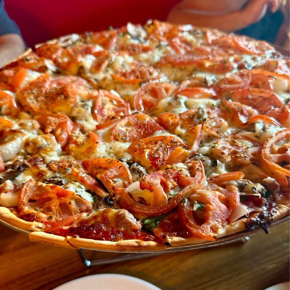 Vegetarian Thin Crust Pizza with sausage Vegetarian Thin Crust Pizza with sausage