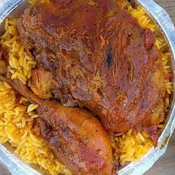 Cibao Invita - Chicken stew over yellow rice. - Spanish Near Me - Bayonne, New Jersey