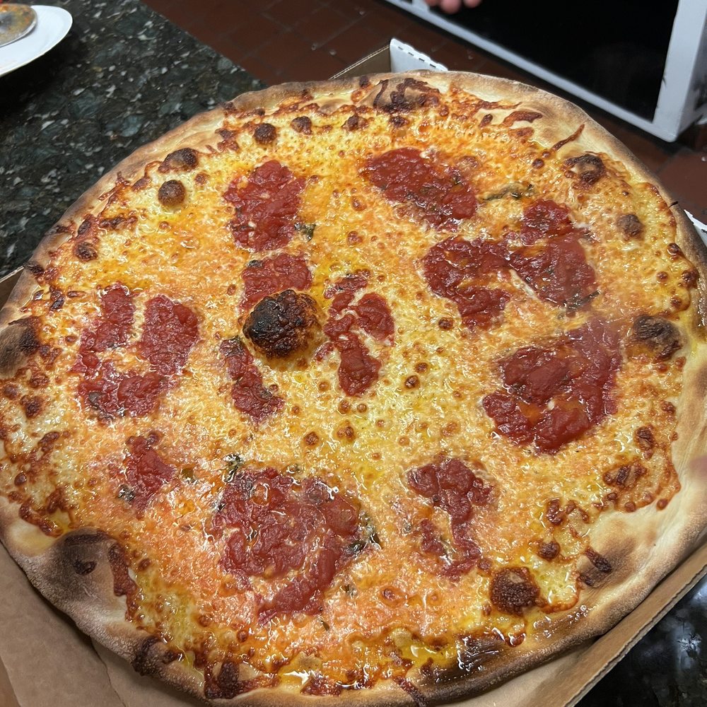 Carla's Pizzeria - White pizza with fresh sauce. - Pizza Near Me - Wayne, Pennsylvania