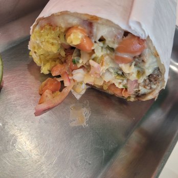 Tacos Y Que - Steak and Shrimp Burrito cut in half - Tacos Near Me - Whittier, California